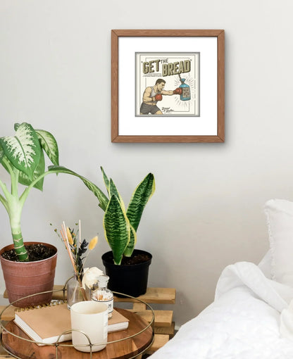 Get The Bread Framed Print
